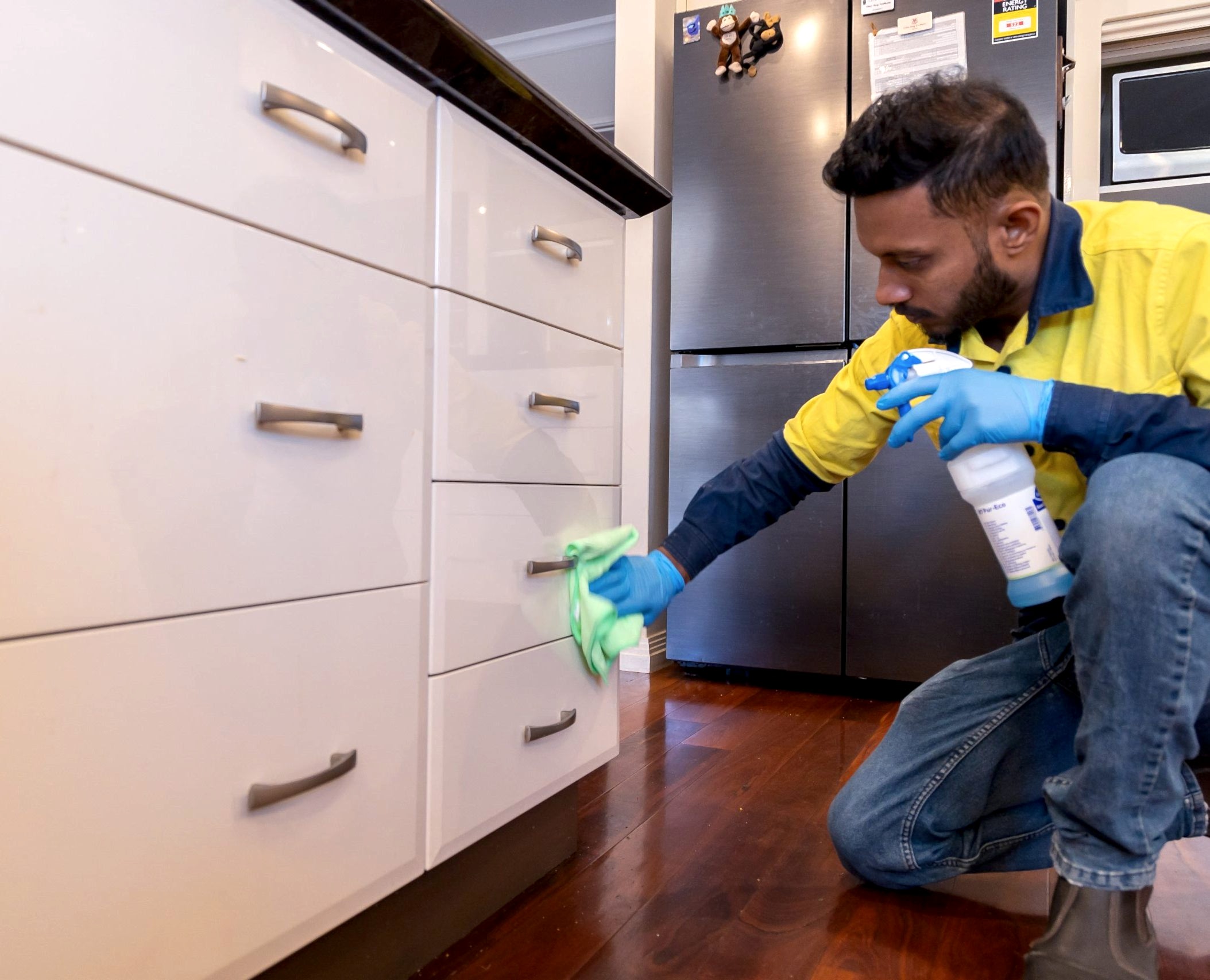 R6 2698 scaled e1702267333643 5 Signs You Need to Hire a Professional House Cleaner NOW 1 cleaner scrubbing drawers