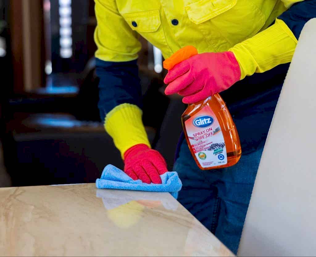 benchtop being scrubbed